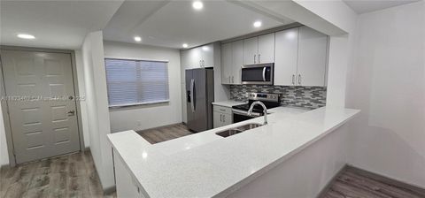 Photo of 100 SW 130th Ter #309C, Pembroke Pines, FL 33027 (MLS # A11823463)