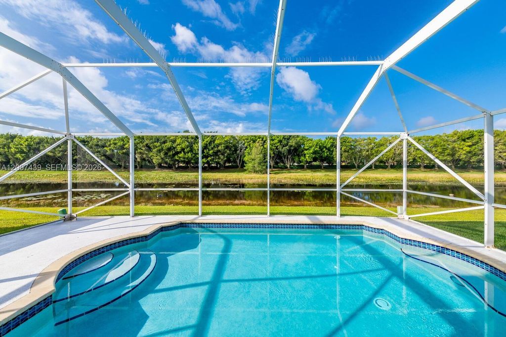 Photo of 801 Tanglewood Cir, Weston, FL 33327 (MLS # A12007439)