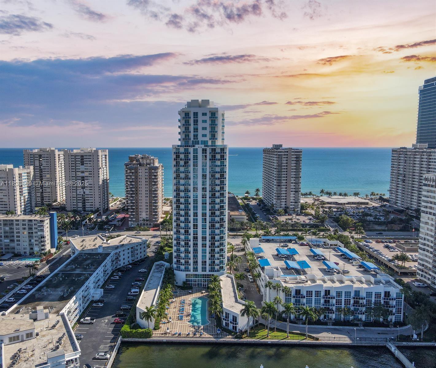 Discover the crown jewel of Ocean Marine Yacht Club—this exquisite corner penthouse is the largest in the building, boasting 2,359 SF of total space (2,050 under air) and soaring 12’ ceilings. Revel in unobstructed, panoramic ocean and Intracoastal views from every room and private balcony. Professionally curated by DKOR Interiors with over $250K in ultra-luxury upgrades: Italian marble floors, custom LED soffit lighting, Lutron & Nest smart systems, bespoke Dayoris doors, California closets, and chef’s kitchen with Italian cabinetry and granite counters. 2 parking spots, valet & storage