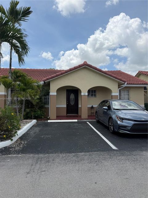 Photo of 7101 W 24th Ave #14, Hialeah, FL 33016 (MLS # A12014818)