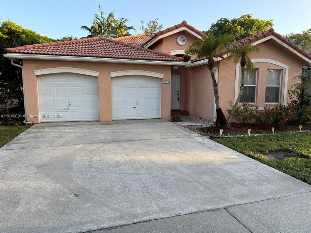 Photo of 14146 S Cypress Cove Cir, Davie, FL 33325 (MLS # A11846891)