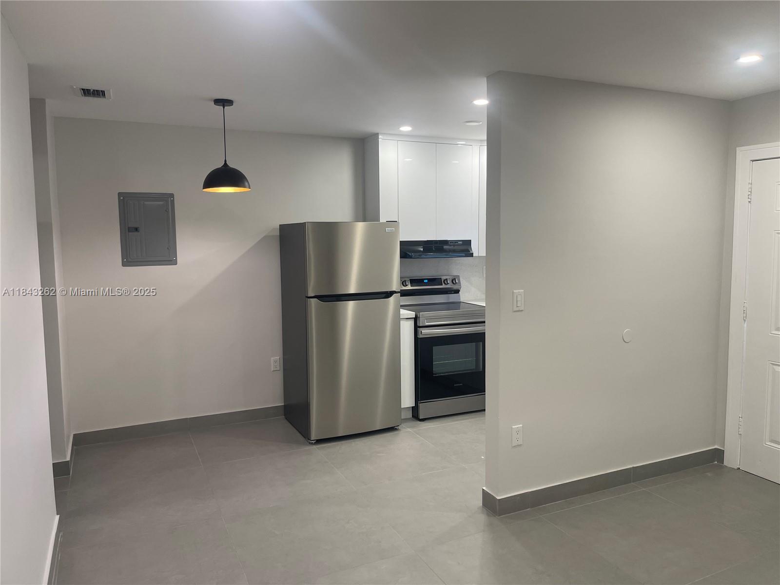 Updated 1/1 in the heart of Hialeah. It features specious and open layout with Italian porcelain tiles throughout. It has a sleek modern kitchen with stainless steel appliances, a bedroom with ample double closet and a bath with updated vanities. The apartment is freshly painted and it boasts LED ceiling lights, elegant finishes and new A/C. It has assigned parking space and laundry on the site.