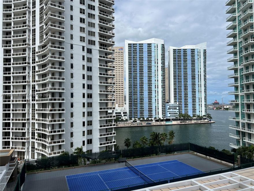 Exquisite corner residence featuring a spacious L-shaped terrace and expansive living area. This elegant unit is filled with abundant natural light and offers breathtaking views of the Bay, Brickell Key Island, and the city skyline. The bright kitchen boasts floor-to-ceiling windows and a charming breakfast nook. Both bedrooms are pristine and beautifully appointed, each with its own en-suite bathroom. A foyer welcomes you into the residence, seamlessly leading to the open and airy living space. Building amenities include concierge service, complimentary valet parking, a state-of-the-art fitness center, a waterfront swimming pool, and recently updated common areas. Ideally situated on the exclusive Brickell Key Island, just moments from the vibrant lifestyle of Brickell and Downtown Miami.