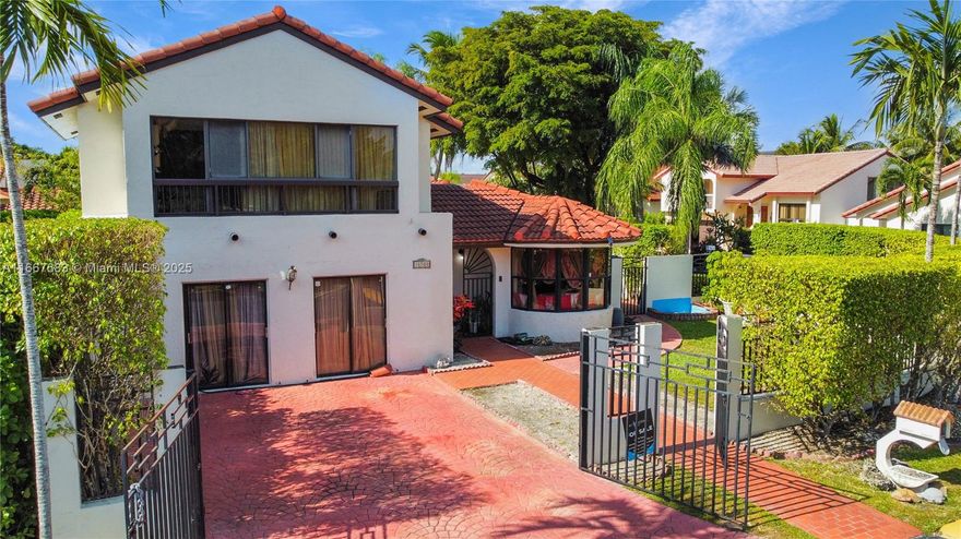 CHEAPEST SQFT PRICE IN THE NEIGHBORHOOD! This stunning gated 5-bedroom, 4-bathroom corner home features marble flooring throughout the first floor and is set in a quiet neighborhood, just steps from Publix and a local park. The updated kitchen boasts a commercial-grade refrigerator and breakfast nook. A separate mother-in-law suite with its own kitchen and bath offers privacy for guests, extended family, or possible rental income (up to 2 bedrooms can be used for this). Enjoy a private pool, plus a recently updated roof and A/C units (both under 3 years old). Conveniently located near major highways for easy commuting. Seller motivated to sell!