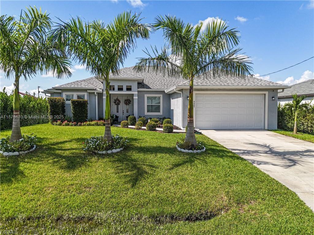 Experience luxury, elegance, and modern living just 12 minutes from Fort Myers. This stunning 4-bedroom, 3-bathroom home was built in 2021 and is beautifully maintained, practically like new. The home features a sprinkler system to keep the lawn lush and green year-round. Step inside and be amazed by the open-concept design, high-end finishes, and spacious layout. The beautiful kitchen includes a large island, modern cabinetry, and top-of-the-line appliances ideal for everyday living and entertaining. The master suite is a true retreat, featuring a walk-in closet and a luxurious coffered tub perfect for relaxing after a long day. The photos speak for themselves, but this is a home you truly need to experience in person. Come and see it and let this beautiful property speak to you.