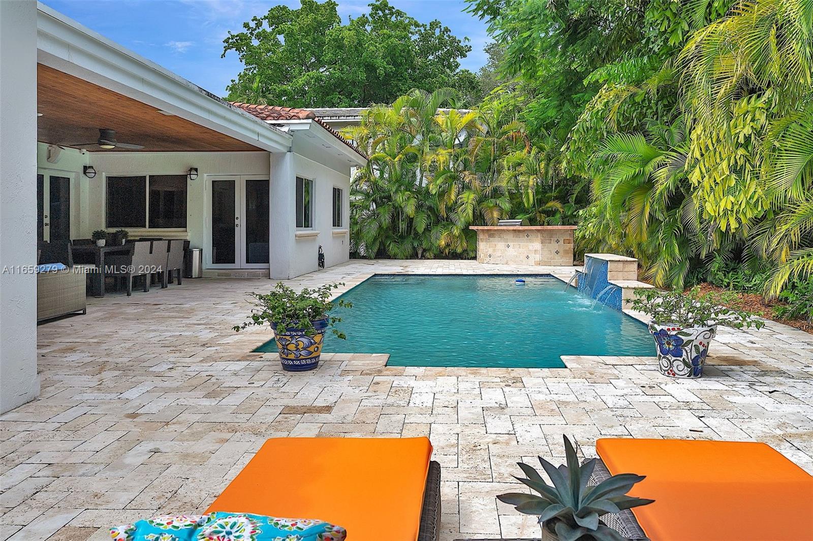 Welcome to this stunning Coral Gables haven, a luxurious modern Spanish home boasting 4 spacious bedrooms, 3 stylish bathrooms, and a sparkling pool. Behind private gates, discover a bright and airy living room with seamless indoor-outdoor living, perfect for relaxing and entertaining. The stylish principal suite features direct access to the pool and patio, while the gourmet outdoor kitchen with Viking BBQ invites al fresco dining and BBQs in the lush backyard oasis. Minutes from the iconic Historic Biltmore Hotel, renowned golf courses, and vibrant Miracle Mile shopping and dining scene, this charming Coral Gables gem offers the ultimate retreat for those seeking luxury, comfort, and convenience.