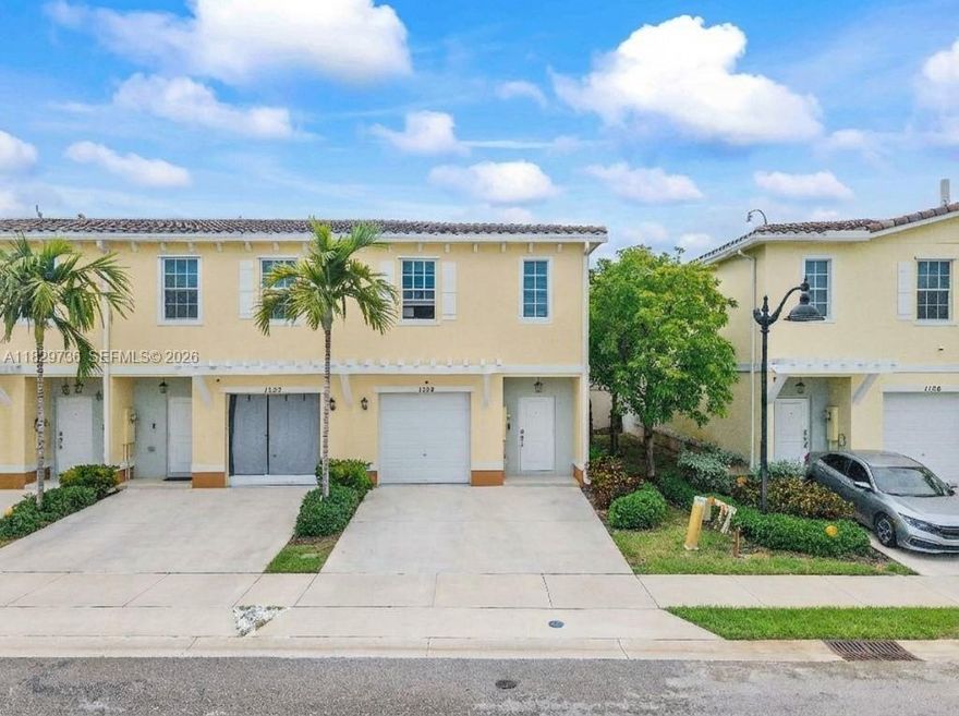 Newly Constructed Townhome Built By DR Horton In 2019. This Beautiful 3 Bed /2.5 Bath Corner Unit With Garage Is Situated On A Peaceful Private Street! This Home Features An Open Floor Plan With Over 1700 Sq Ft. Upgraded Kitchen With Granite Counters, Stainless Steel Appliances. Lots of Cabinet Space And A Pantry. Tile Floors. Full Size Washer/ Dryer.  Screened Patio. 1-Car Garage Plus 2 Parking Spaces. Full Hurricane Protection. This Gated Community Has A Pool, Clubhouse, Children Playground & More. Low HOA Fee Only $197 Per Month. FHA/VA APPROVED! PRIME LOCATION: Walk to Lauderhill Mall, Central Broward Regional Park, Water Park. Live Next To America's ONLY ICC-Certified International Cricket Stadium! T20 World Cup 2024 Was Played Here.  Great For An Owner Or Investor! Corner Units Rarely Available! Schedule Your Tour Today!