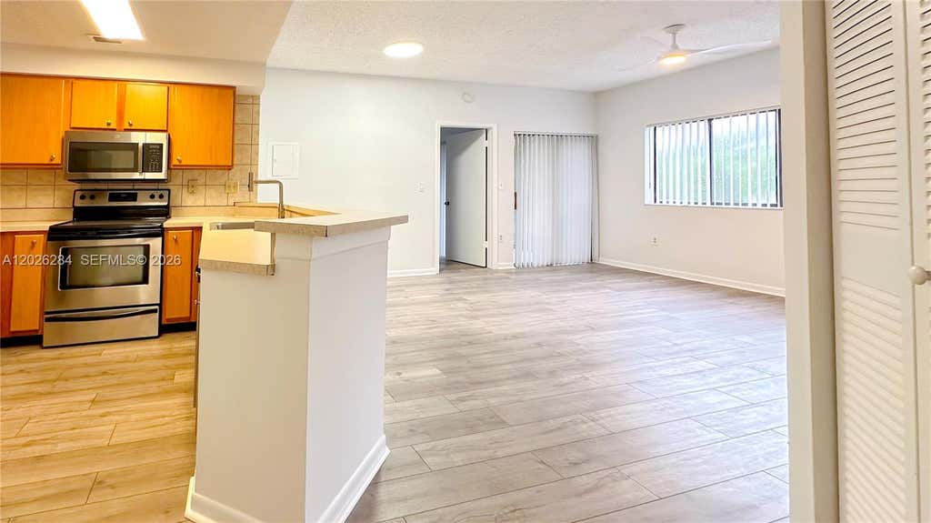 Photo of 2445 SW 18th Ter #107, Fort Lauderdale, FL 33315 (MLS # A12026284)