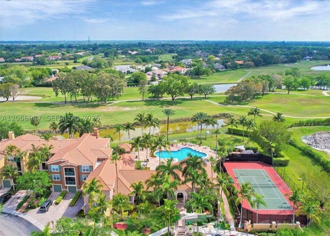 Photo of 11710 Saint Andrews Pl #202, Wellington, FL 33414 (MLS # A12066947)