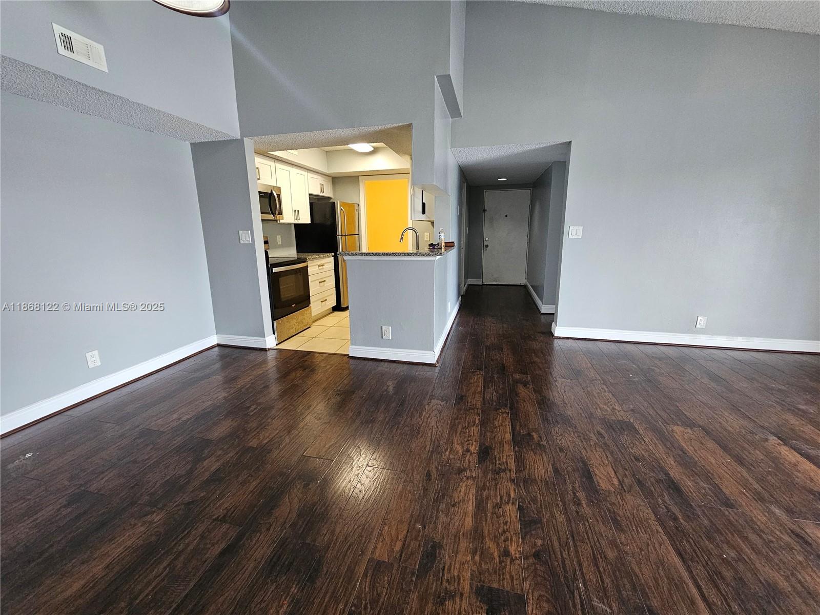 FAST APPROVALS! Beautiful condo in SUN VISTA GARDENS located just off COMMERCIAL BLVD. AT 441 & TURNPIKE. ASSIGNED PARKING with plenty of guest parking. REMODELED KITCHEN & BAR AREA, VAULTED CEILINGS, BALCONY, and a serene GARDEN VIEW. Inside you’ll find a LAUNDRY ROOM WITH WASHER & DRYER, abundant closet space, and modern CEILING FANS. This GATED COMMUNITY offers resort-style amenities including POOL, GYM, TENNIS COURT, CLUBHOUSE, AND JACUZZI. Condo is conveniently situated TWO SHORT STORIES UP (no elevator). PETS ALLOWED with non-refundable deposit and written approval (Breed Restrictions subject to local laws and insurance requirements).