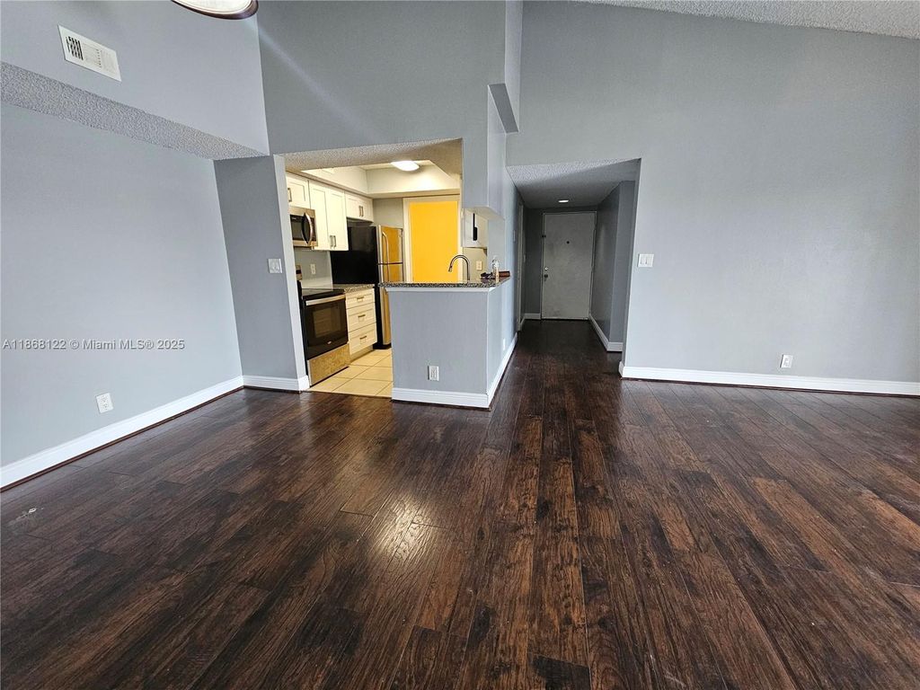 Photo of 5686 Rock Island Rd #136, Tamarac, FL 33319 (MLS # A11868122)