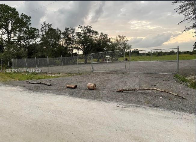 Welcome to Montura Ranches! This beautiful 1.25 acres is ready for you to build your dream home. This vacant land is perfectly situated just south of Hunting Club Road. The Community offers a Clubhouse featuring a swimming pool, recreation facilities, parks, a playground, and basketball courts. Its center also hosts afterschool programs and summer camps for kids and the Early Childhood Center is next door. Montura also has a Private Reservoir for landowner use that allows horse back riding, camping, fishing, and hunting. Healthy rural living. Certified Land Survey Layout and plan layout of the property available. Half of the property has been filed with asphalt rap spread and compacted. Fully fenced. 20' wide gate. Asphalt driveway and drainage pipe approved by county.