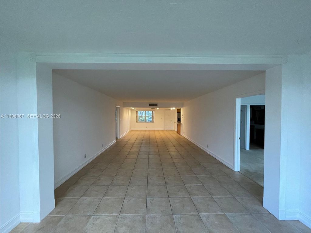 Photo of 4009 N Cypress Dr #105, Pompano Beach, FL 33069 (MLS # A11996587)