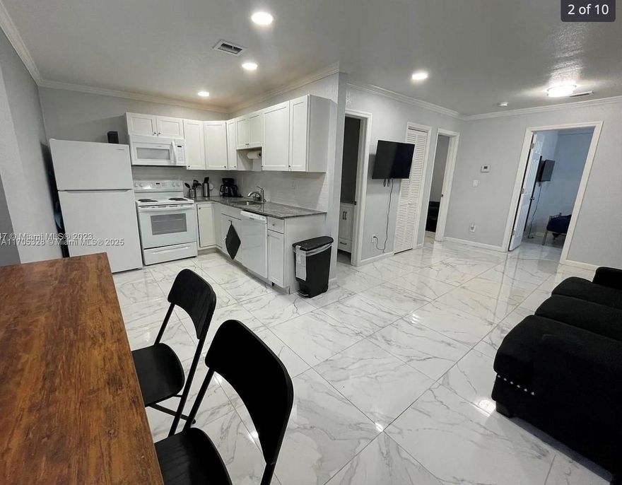 Investors dream! 4 renovated 2 bed 1 bath. 8,700 MONTHLY income. All long-term tenants. Central AC and washer and drier in each unit! Call / Text listing agent for videos. Will not last! - CALL FOR SHOWING