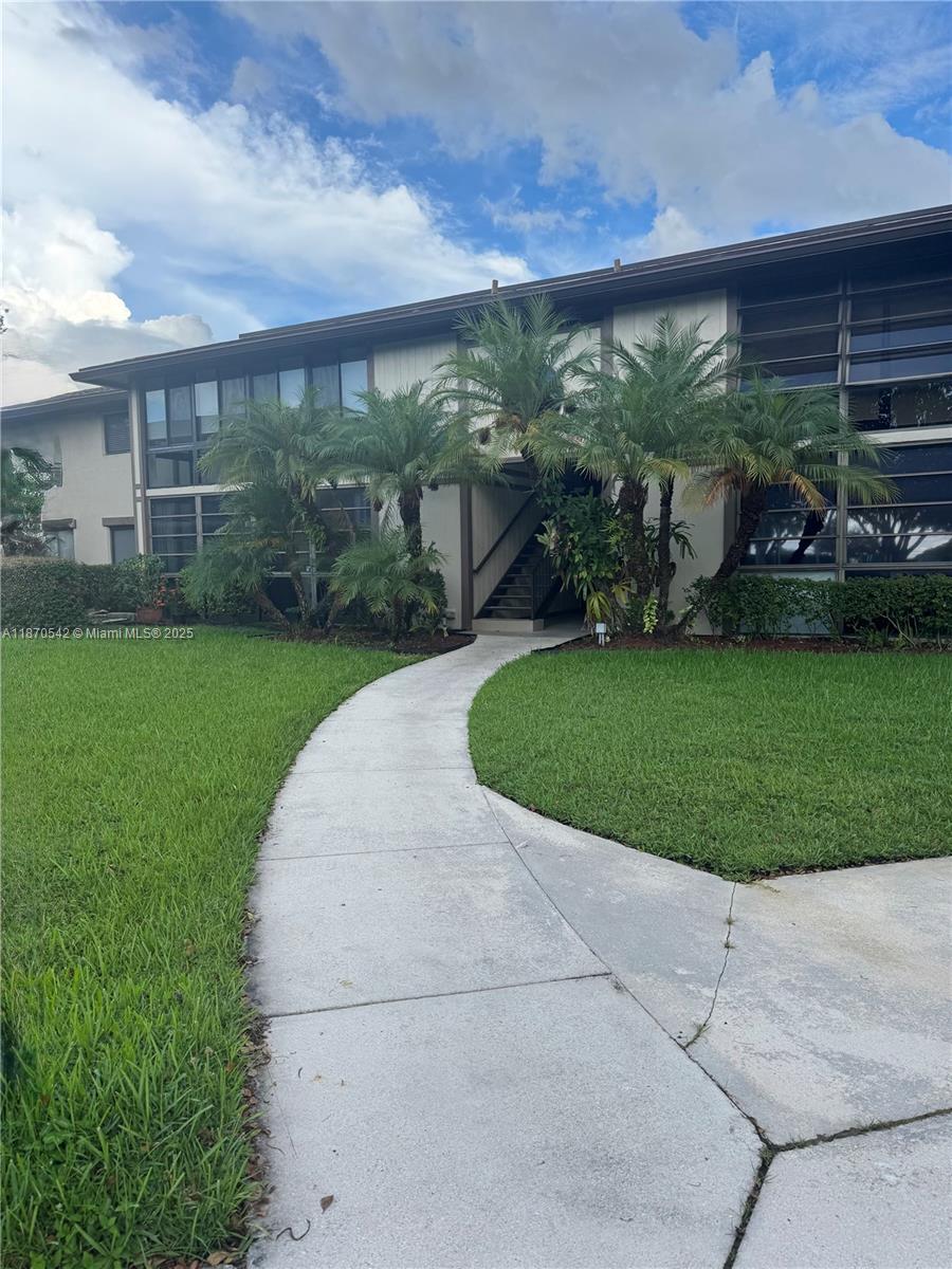 Welcome to this fully remodeled 2-bedroom, 2-bathroom, in the heart of Tamarac. Featuring new tile floors, a washer & dryer, and an assigned parking space, this spacious unit is move-in ready. Enjoy abundant natural light, a modern kitchen, and a private patio perfect for enjoying. The community offers resort-style amenities including a pool, clubhouse, and landscaped common areas. Ideally located near schools, restaurants, shopping, and major highways — a great opportunity for both homeowners and investors.