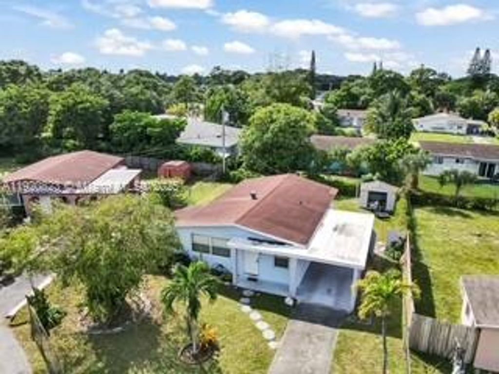 Photo of 1041 NW 24th Ter, Fort Lauderdale, FL 33311 (MLS # A11920823)