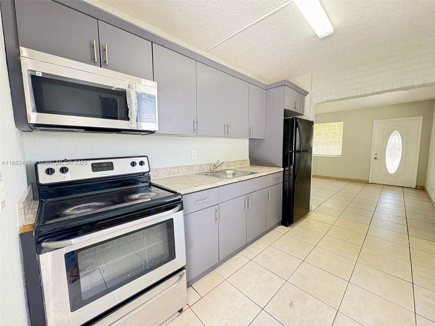 Very well-located single-family home in Pompano Beach, featuring two bedrooms and one bathroom, + a small office and laundry room. Tile throughout, NO carpet. Easy to show. Very well located, close to major public transportation. This property will be delivered to the tenants with stainless steel appliances. (Refrigerator, Micro, and electric Range). If a pet is approved, a non-refundable deposit of $300 will be required. Dogs can weigh up to 20 pounds; landlords don’t accept dogs weighing over that. Before moving in, the landlord requires mandatory renter insurance, the first month, and two security deposits.
