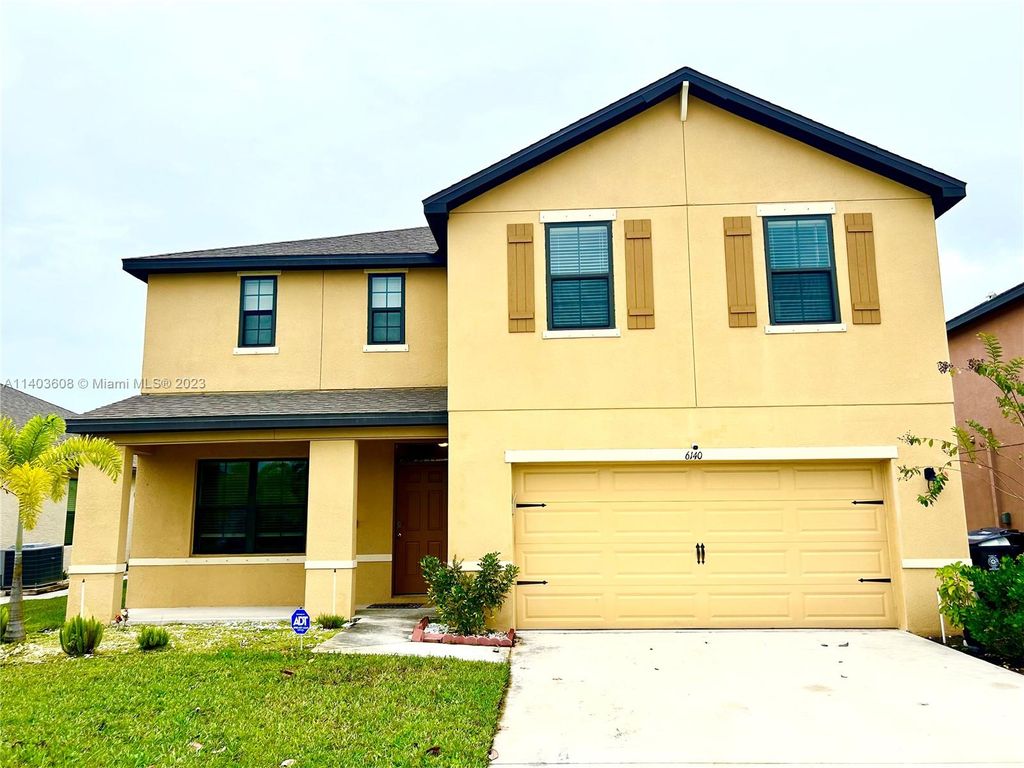 Photo of 6140 NW Regent St, Port Saint Lucie, FL 34983 (MLS # A11403608)