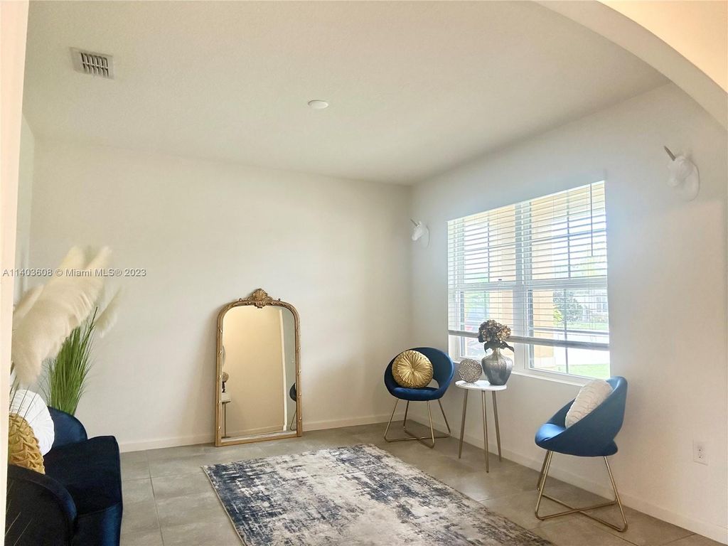 Photo of 6140 NW Regent St, Port Saint Lucie, FL 34983 (MLS # A11403608)