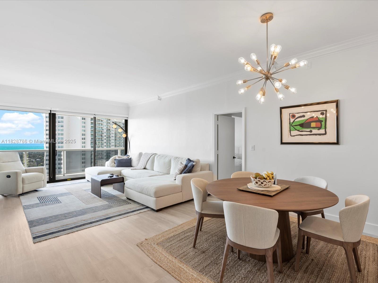Experience elevated coastal living in this beautifully renovated penthouse condo, offering stunning panoramic views of the Intracoastal and ocean. This light-filled residence features brand-new flooring and fully updated bathrooms, blending modern elegance with comfort. Located in a prime area just minutes from the beach, Aventura Mall, and top dining spots, you’ll enjoy both convenience and luxury. The secure, gated building offers full amenities for a resort-style lifestyle. Whether you're seeking tranquility or vibrant city access, this penthouse delivers it all. 40-year recertification completed—move in with confidence!