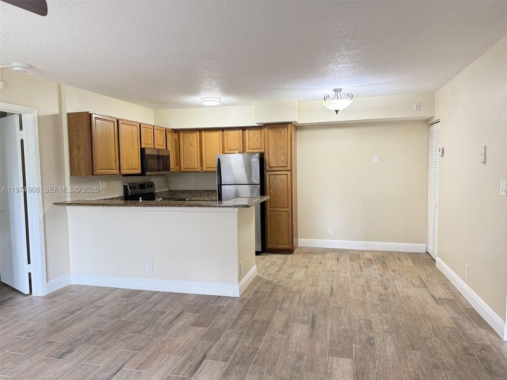 Photo of 811 Lyons Rd #20104, Coconut Creek, FL 33063 (MLS # A11974968)