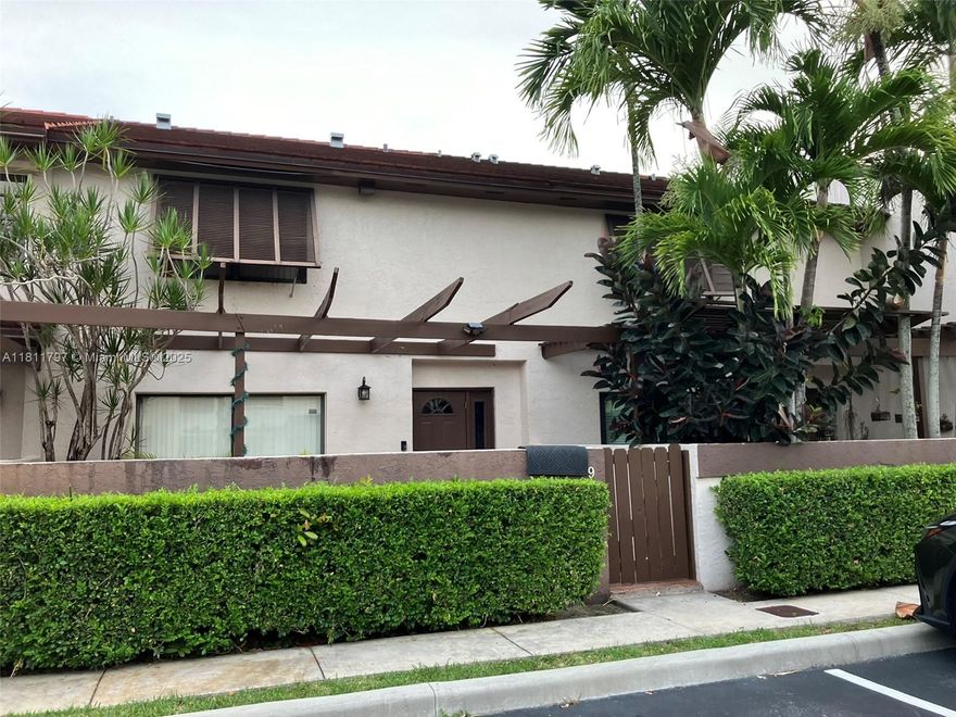 Beautiful townhouse in Calusa Point with 3 bedrooms, 2 bathrooms and a half bathroom downstairs. Ample walking closets. Updated Kitchen countertops. Laminated floors.  Living area: 1,78 sf on a 2,200-sf lot. Spacious patio. Washer & Dryer. Two assigned parking spaces in front of unit plus ample king. New roof replaced in 2022. One of the lowest HOA fees in area. Calusa Point is a well maintained and securely gated neighborhood with a 24-hour guard. Well maintained landscape. Community pool, Tennis Court, racquetball and basketball courts and more for entertainment. Centrally located near A-rated schools, shopping, dining and major roads. This is not a condo, so property will qualify with FHA. Please make your appointment through Showing Assist.