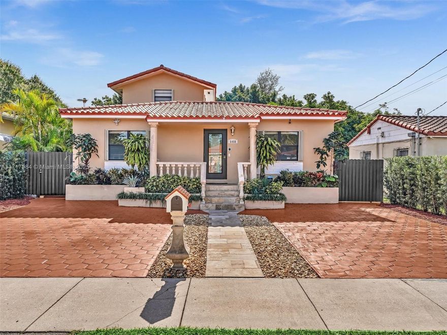 Centrally located and spacious two-story renovated home with 4 bdrs 3 baths. Upgrades include 2 new Rheem 4-ton HVAC units with UV light, new impact doors & hurricane shutters. Split layout with in-law quarters and a private side door entrance.  House has two full kitchens including two sets of washer/dryer. Main house has 3 bdr 1 bath and in-law quarters has 1 large master bedroom, 2 full baths, walk-in closet & den. It’s like buying 2 houses for the price of 1! Spanish style barrel tile roof in great condition.  Beautiful concrete terracotta driveway for 4 cars.  Meticulously landscaped and maintained backyard with fruit trees and privacy hedge.  Large covered terrace, pergola, and a large storage shed. NO HOA!