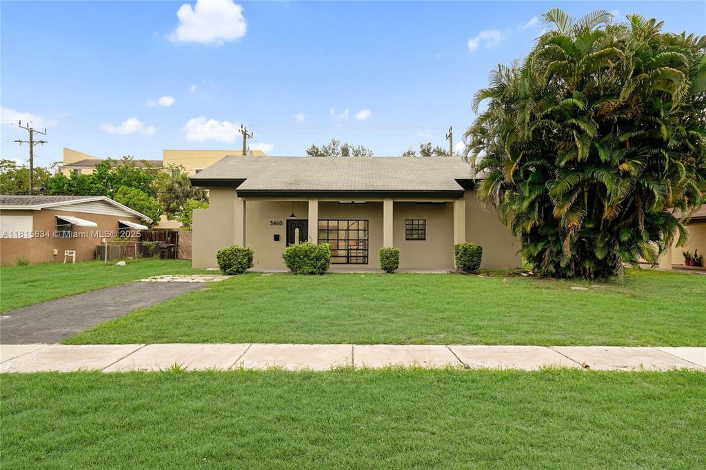 Photo of 3460 NW 43rd Ave, Lauderdale Lakes, FL 33319 (MLS # A11815834)