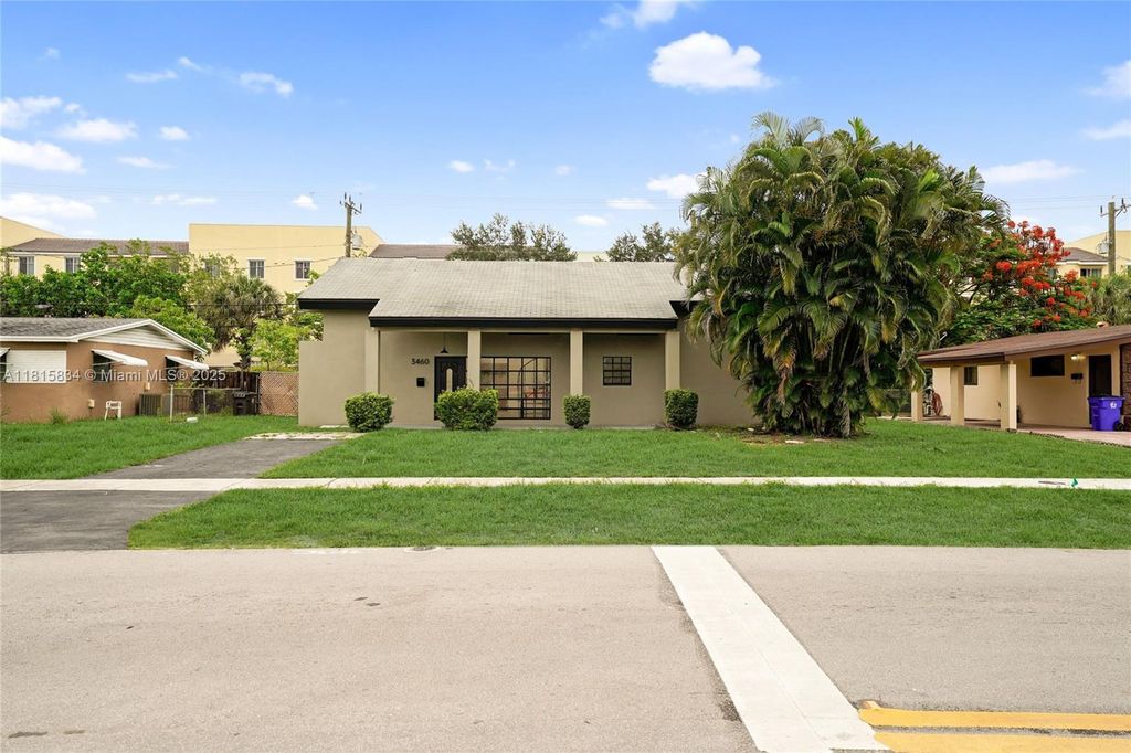 Photo of 3460 NW 43rd Ave, Lauderdale Lakes, FL 33319 (MLS # A11815834)