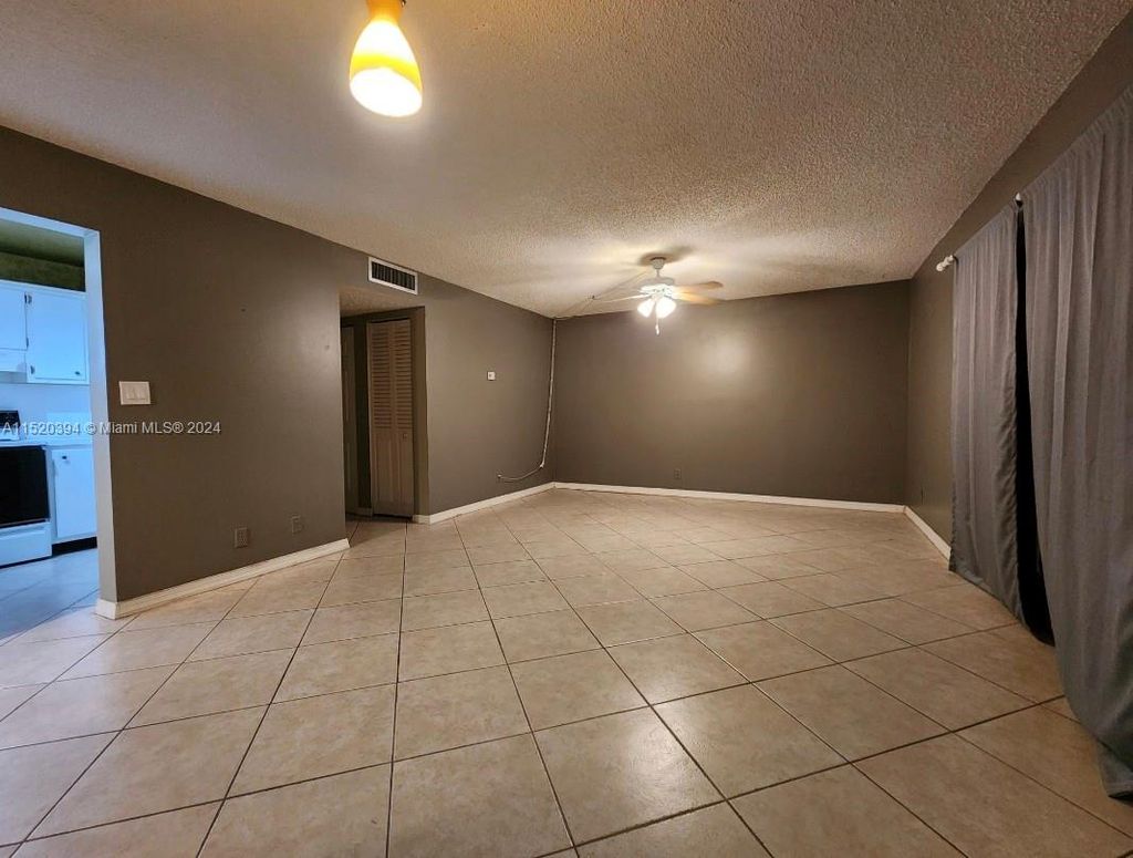 Photo of 301 N Pine Island Rd #117, Plantation, FL 33324 (MLS # A11520394)