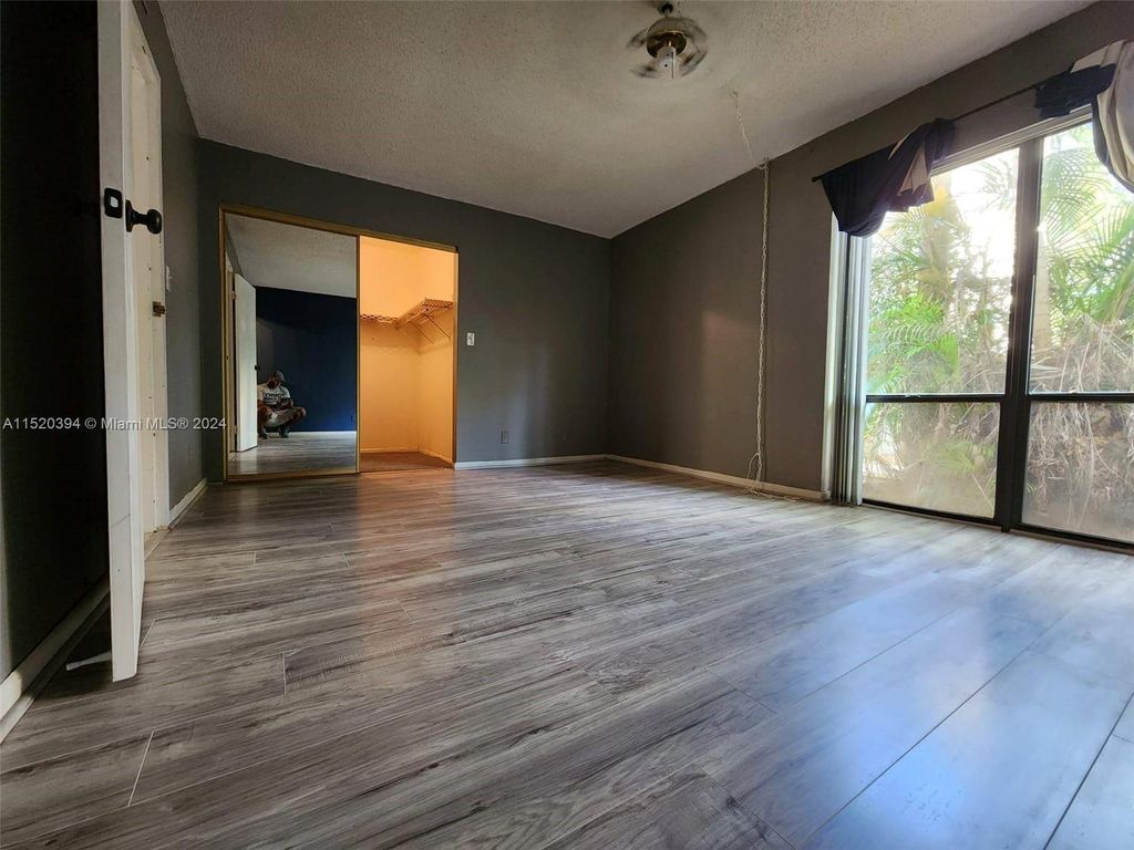 Photo of 301 N Pine Island Rd #117, Plantation, FL 33324 (MLS # A11520394)