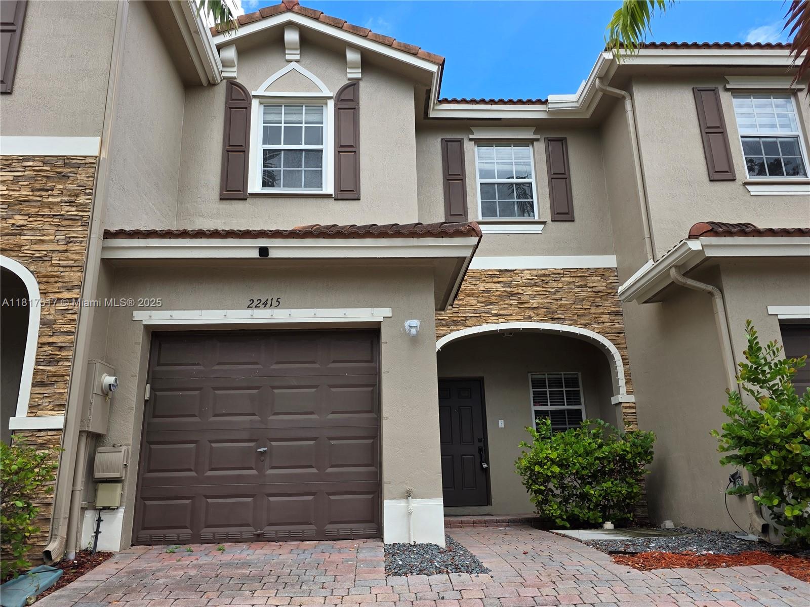 This is a townhouse built in a great community with many amenities, NEVER GET BORING having a nice clubhouse with large pool and child play area. Also balcony facing to the big and nice lake. Home features central heating, central cooling, water heater, garage, garage opener and appliances like electric stove with oven, microwave, refrigerator with icemaker, dishwasher, garbage disposal, washer and dryer. First floor living-dining very spacious. Family room and nice size kitchen area with view to the backyard with pavers all the corners. This is a comfortable unit that you can call HOME.