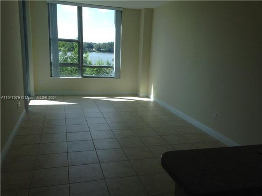 Photo of 2641 N Flamingo Rd #305N, Sunrise, FL 33323 (MLS # A11647079)