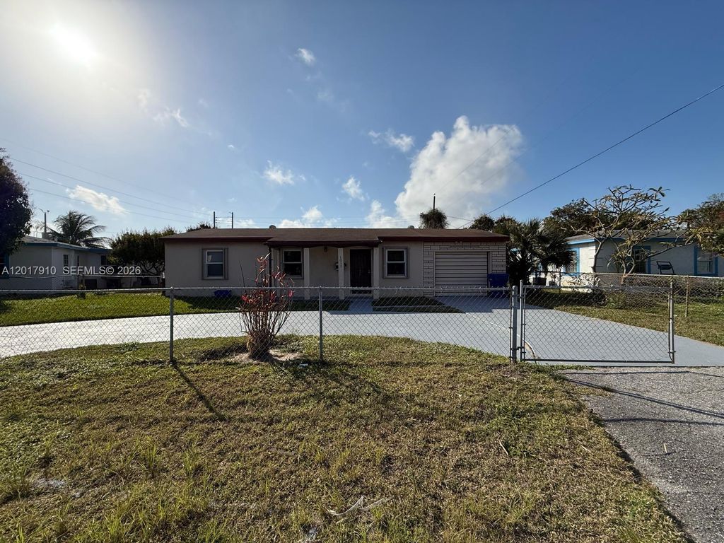 Photo of 1011 Avenue F #0, Riviera Beach, FL 33404 (MLS # A12017910)