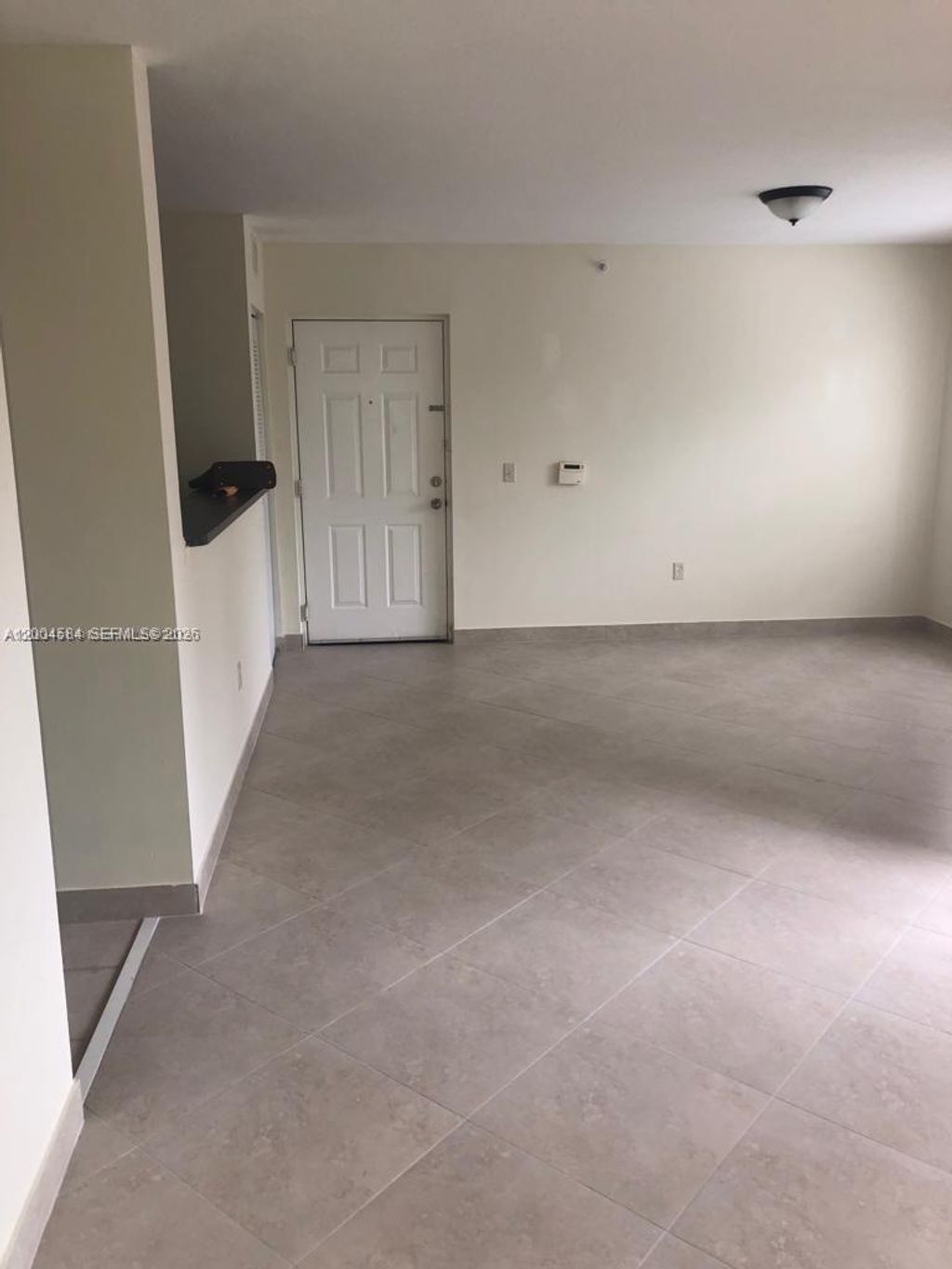 Photo of 4131 San Marino Blvd #203, West Palm Beach, FL 33409 (MLS # A12004584)