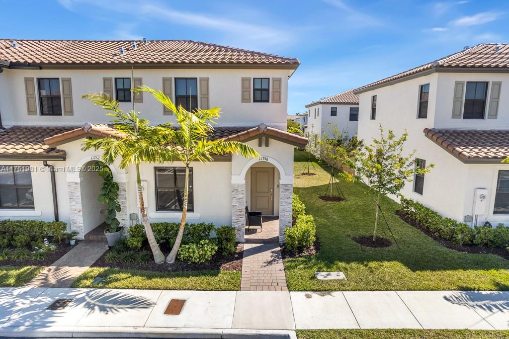 Discover this modern 2-story townhouse in the sought-after Corsica community, offering 3 bedrooms and 3 bathrooms. Enjoy a fenced backyard, covered patio, stainless steel kitchen appliances, and granite countertops. Residents have access to luxurious amenities like a clubhouse, gym, pool, and 24-hour security, all in a prime location near shopping, dining, and the Turnpike.