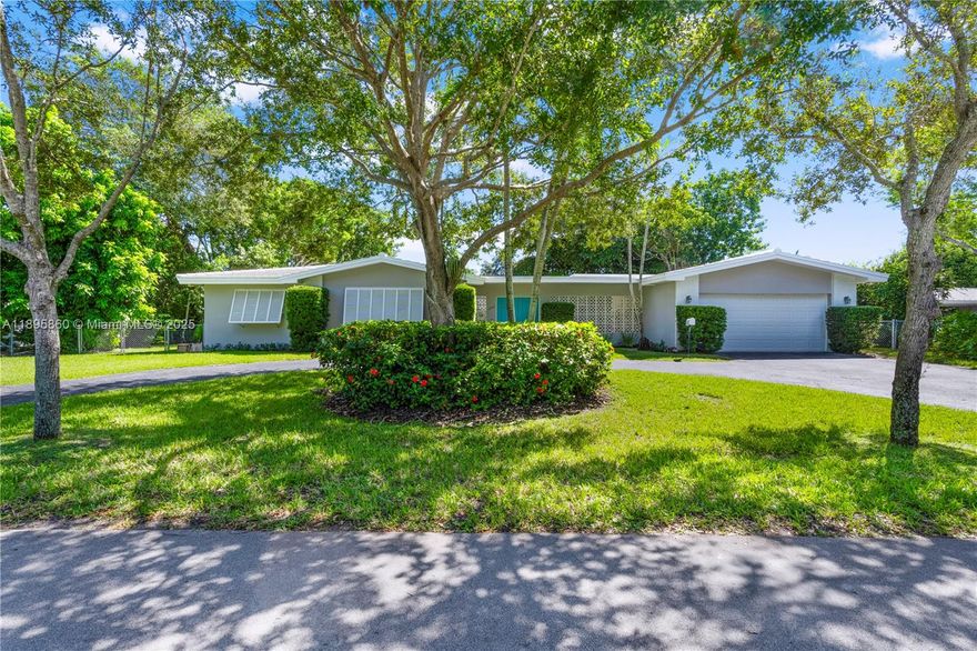 Adorable and rarely available North Palmetto Bay Jennings Pool Home gem! This lovingly maintained 3 BD/2 BA is light, bright, and tucked away on a tree-lined street steps away from the area's top schools and parks. Enter into a covered screened courtyard with a saline pool, outdoor dining, bar, and sitting area offering seamless indoor/outdoor living perfect for relaxing/entertaining. A spacious, open-concept living area features a built-in entertainment center, new flooring, and an updated eat-in kitchen with granite countertops, new appliances, impact windows, an updated primary bath, a generous lot, and an air-conditioned 2-car garage. Move right into this special home and start enjoying this sought-after neighborhood and South Florida living at its best!