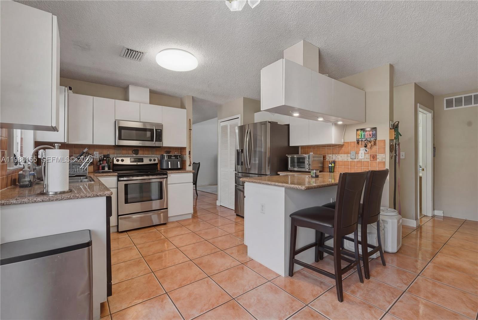 SHOMA HOMES AT TAMIAMI II - Residential