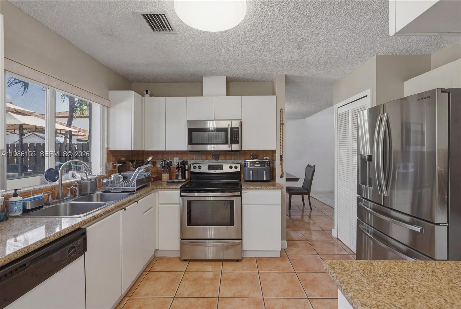 SHOMA HOMES AT TAMIAMI II - Residential