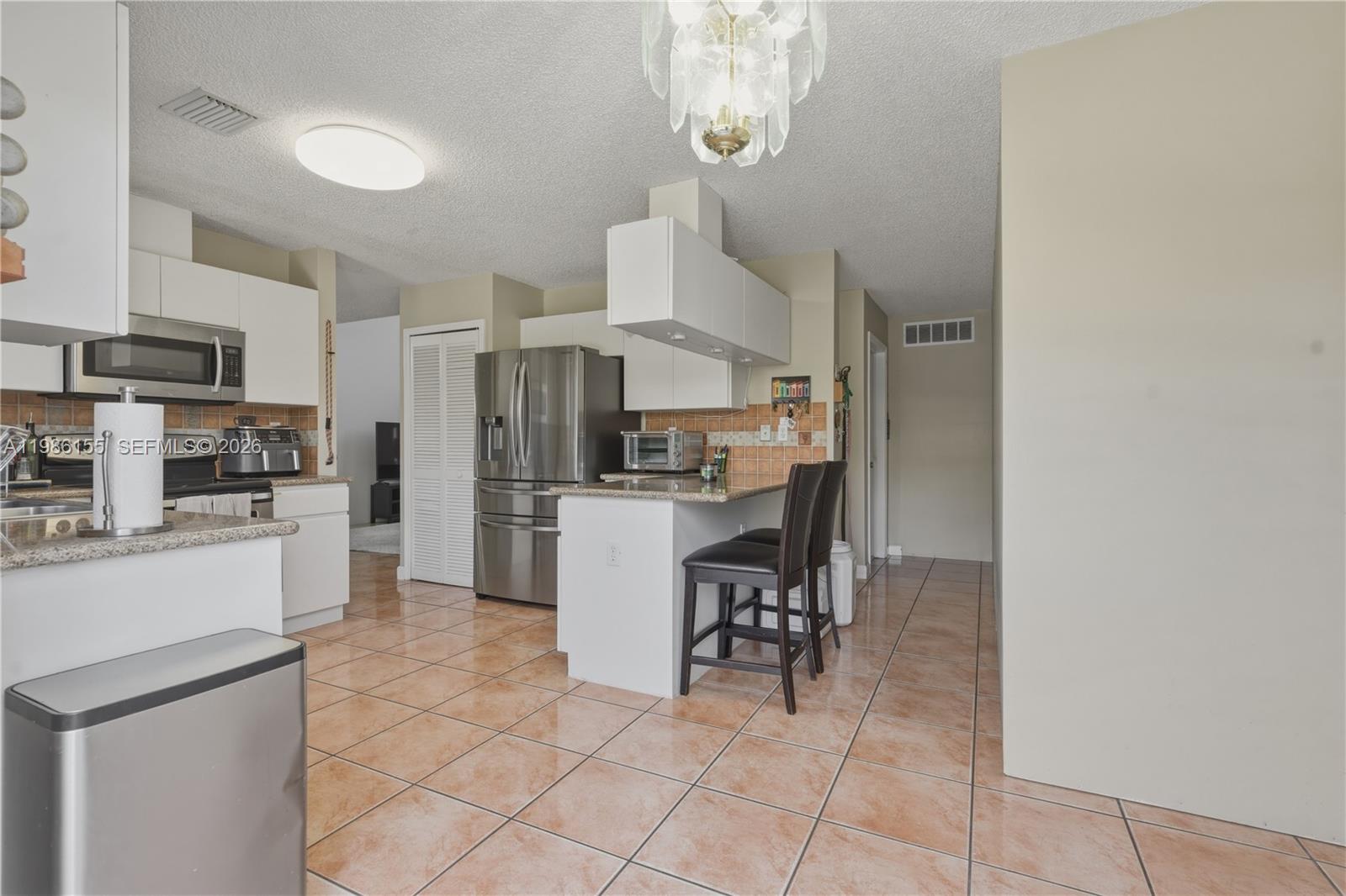 SHOMA HOMES AT TAMIAMI II - Residential