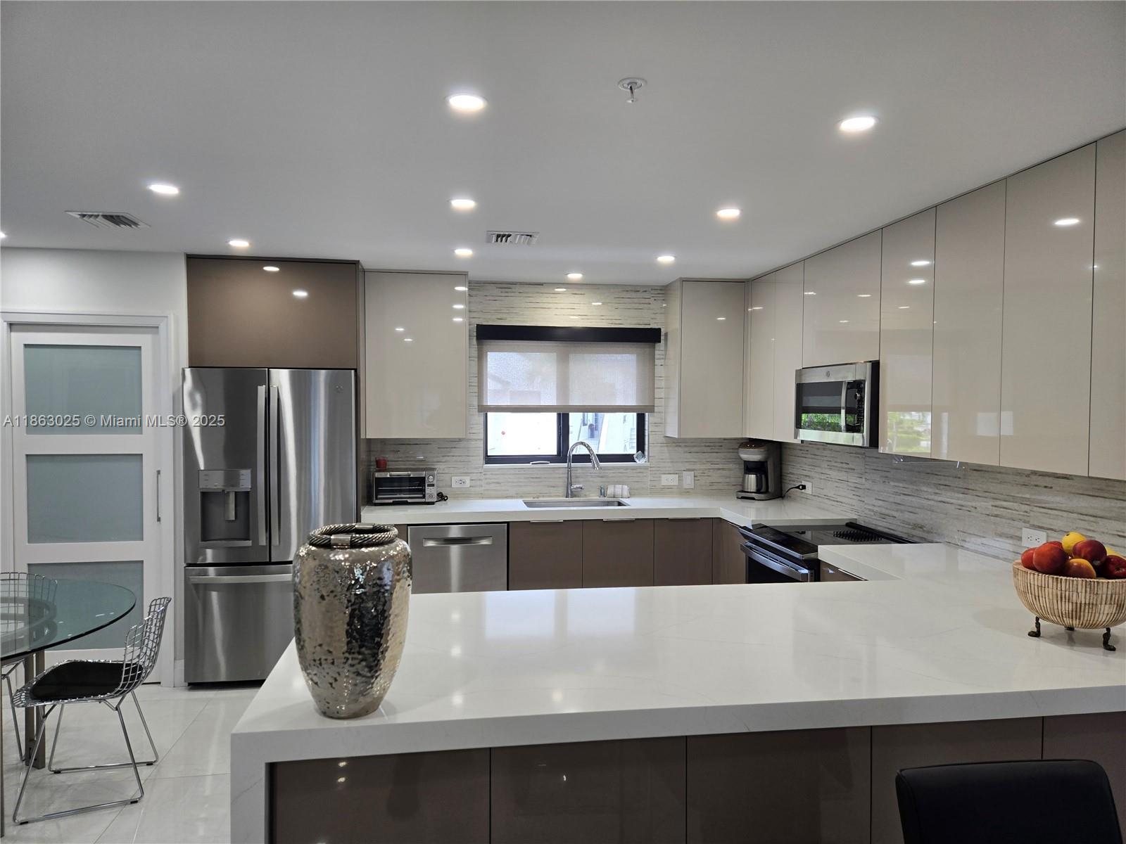 This beautifully and tastefully renovated home is a must-see! No detail was spared in the transformation of this stunning property,
which offers picturesque views of the lake and golf course. Light, bright, and airy with soaring ceilings, the home exudes an open and inviting atmosphere.
Features include high-impact windows, a newly installed front door, and updated ductwork for optimal comfort.
The lanai has been thoughtfully renovated to create a perfect space for relaxation. Every upgrade has been completed—this home is truly move-in ready!
