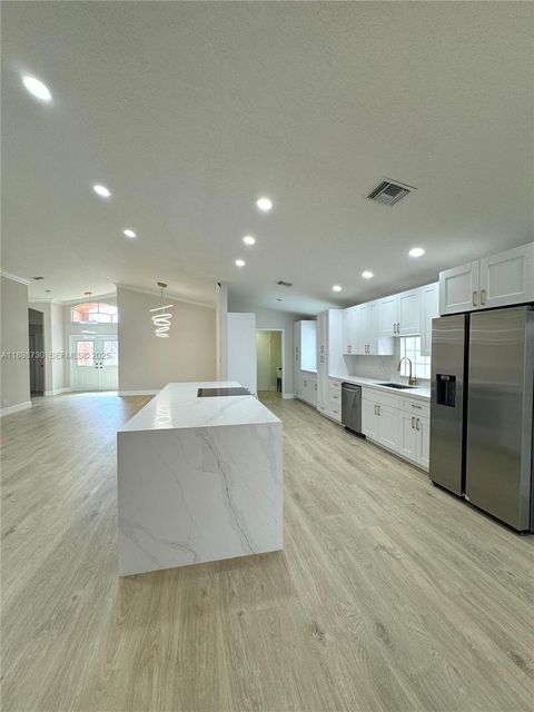 Photo of 7633 Trapani Ln, Boynton Beach, FL 33472 (MLS # A11898730)