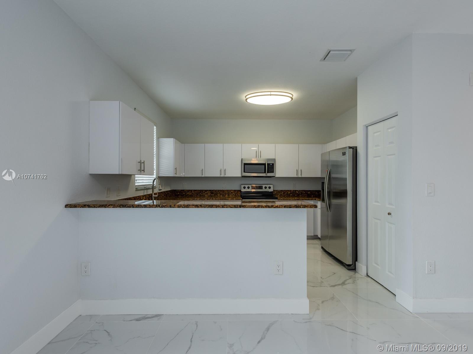 TUSCANY VILLAS WEST - Residential