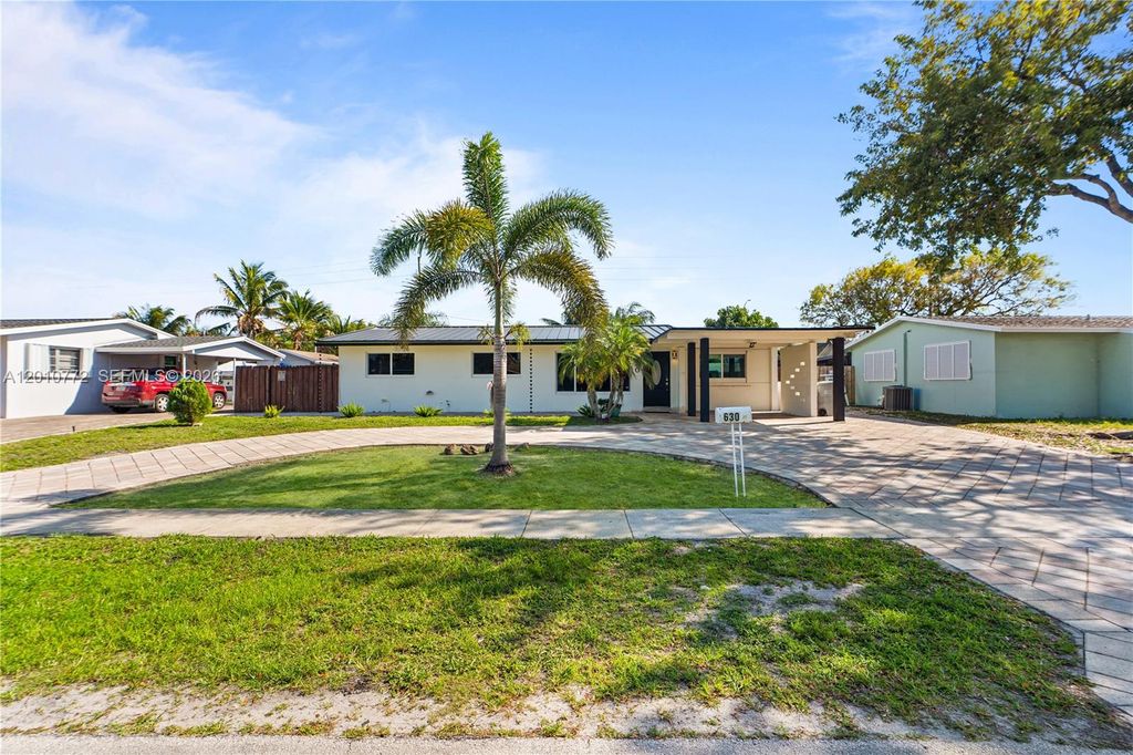 Photo of 630 NE 23rd Ct, Pompano Beach, FL 33064 (MLS # A12010772)