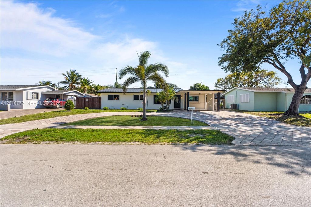 Photo of 630 NE 23rd Ct, Pompano Beach, FL 33064 (MLS # A12010772)