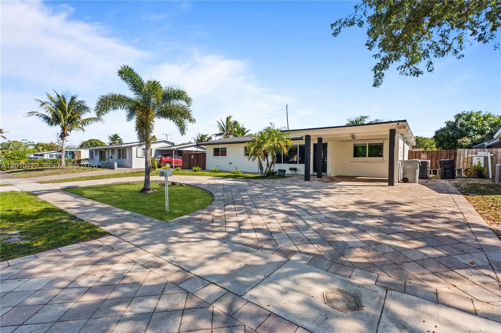 Photo of 630 NE 23rd Ct, Pompano Beach, FL 33064 (MLS # A12010772)