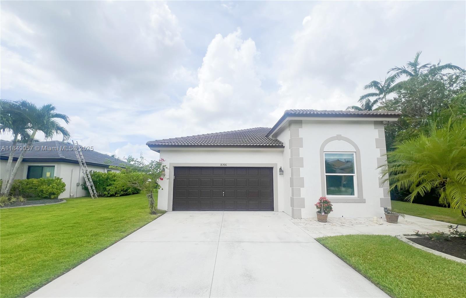 Beautiful lakefront 3BR/2BA single-family home in the prestigious guard-gated community of The Beaches at Pembroke Shores. This meticulously maintained property features a renovated kitchen with granite countertops and wood cabinets, updated bathrooms, hurricane impact windows, and tile flooring throughout. Primary bedroom offers engineered wood flooring and stunning lake views. Additional features include epoxy garage flooring, 2020 A/C, and a new roof scheduled for installation. Enjoy serene lakefront living close to A-rated schools, shopping, dining, and major highways. available after Aug 16th