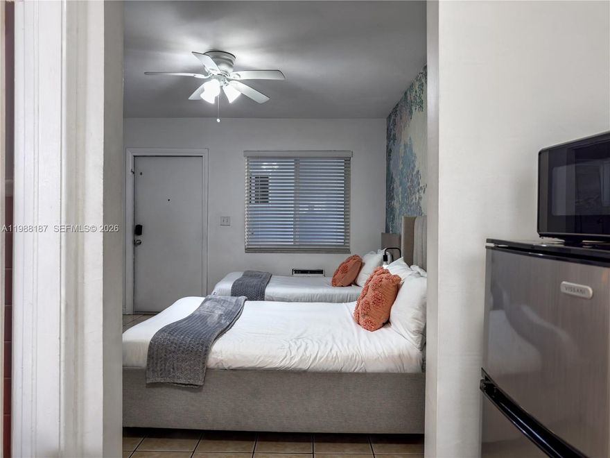 Beach blocks away. Nightlife around the corner. South Beach at your doorstep. This bright 2-bedroom residence at The Empire Condo places you just blocks from the sand and surrounded by the best of Miami Beach — cafés, restaurants, nightlife, and boutique shopping all steps away. Inside, the unit features updated kitchen finishes, laminate flooring, and light-filled living spaces. Perfect for a beachside second home, weekend escape, or full-time South Beach lifestyle.