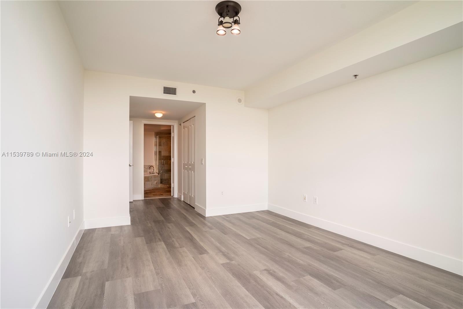 TAO SAWGRASS CONDOMINIUM - Residential Lease