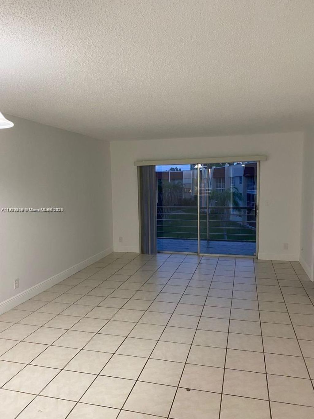 Photo of 1638 Embassy Dr #312, West Palm Beach, FL 33401 (MLS # A11920959)